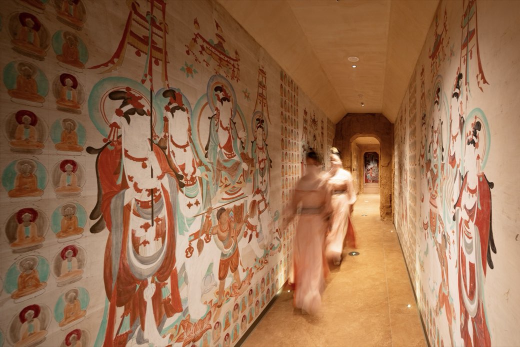 A corridor of hand-painted flying apsaras