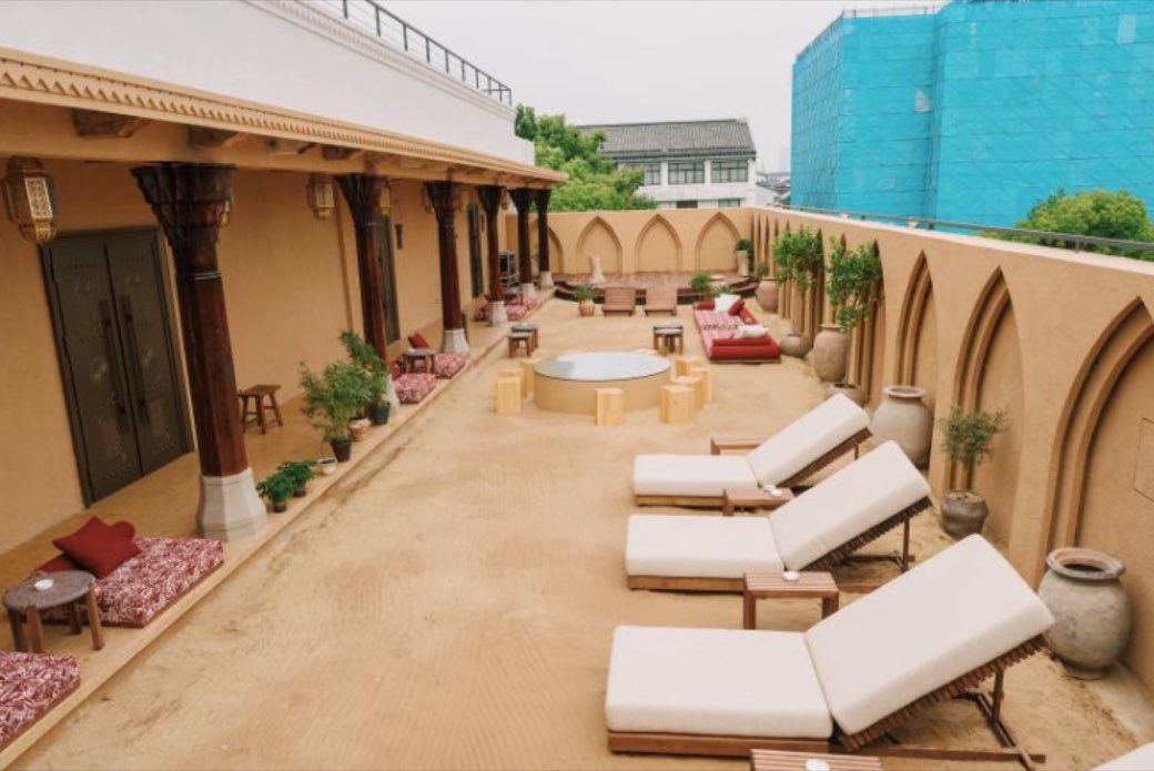 The rooftop terrace, set out with loungers
